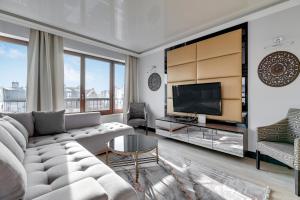 Telewizja i/lub zestaw kina domowego w obiekcie Blue Mandarin Marina