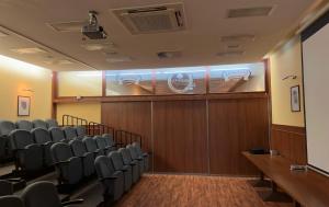 a conference room with chairs and a screen in it at Penzion Quercus in Dubové