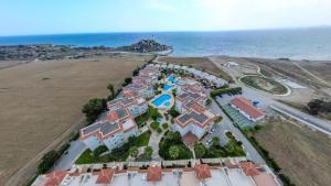 an aerial view of a resort near the ocean at Sesta Home Cyprus in Kalecik