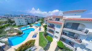 an aerial view of a resort with a swimming pool at Sesta Home Cyprus in Kalecik