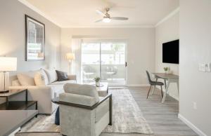 a living room with a couch and a table at Landing Modern Apartment with Amazing Amenities (ID4278) in Anthem