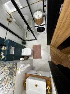 Koupelna v ubytování Apartament Starówka Bulvar 11 Garaż gratis !