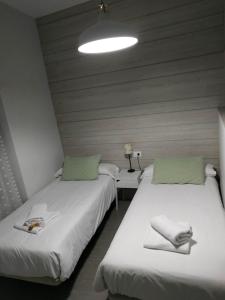 Posteľ alebo postele v izbe v ubytovaní Patio de Arance
