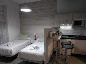 Posteľ alebo postele v izbe v ubytovaní Patio de Arance