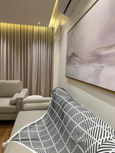 Χώρος καθιστικού στο شقق وأستوديوهات فخمة Skyline luxurious Apartments and Studios Riyadh