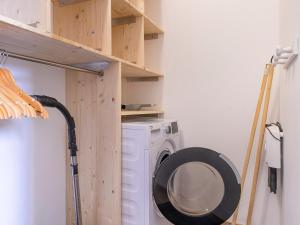 a laundry room with a washer and a washing machine at Studio Avoriaz, 1 pièce, 4 personnes - FR-1-314-272 in Morzine