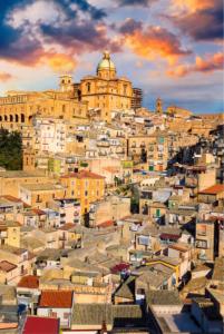 a view of a city with a large building at Da zia Iole a piazza Armerina città dei mosaici patrimonio dell'unesco in Piazza Armerina