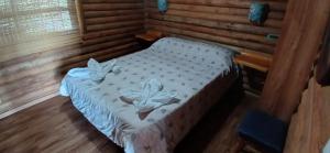 Llit o llits en una habitació de Cabaña Las Marias