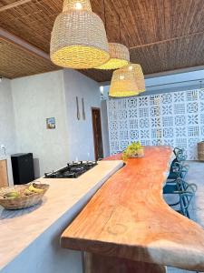 a kitchen with a wooden counter top in a room at CASA AL MARE in Prado