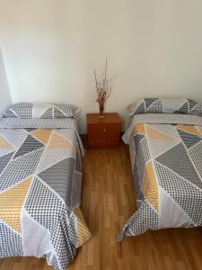 Postel nebo postele na pokoji v ubytování El rincón de Zamora + 2 fotografie