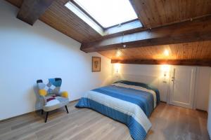 Voodi või voodid majutusasutuse La casa del pittore Squillantini suite toas