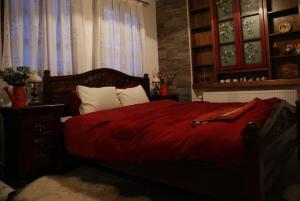 Tempat tidur dalam kamar di Αρχοντικό Ειρήνη - 4 Metsovo