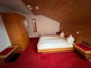 Postel nebo postele na pokoji v ubytování Hotel Andrea
