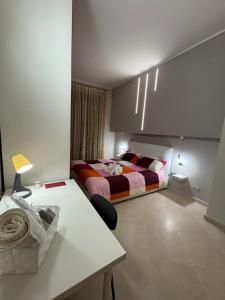Ένα ή περισσότερα κρεβάτια σε δωμάτιο στο Maison Dante