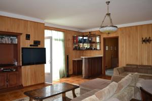 TV a/nebo společenská místnost v ubytování Green Cape Holiday Home