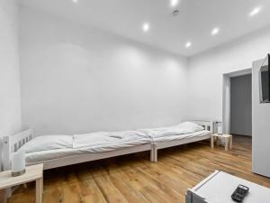 Een bed of bedden in een kamer bij CityChalet Monteur Apartments