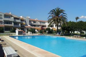 Swimming pool sa o malapit sa Mijas Costa El Faro 2 Apartamento playa