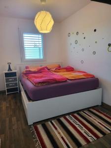 Postel nebo postele na pokoji v ubytování appartement cosy