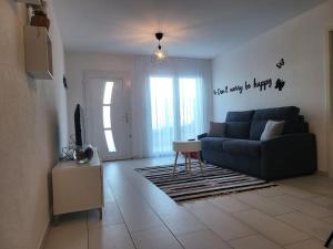 Posezení v ubytování appartement cosy + 4 fotografie