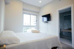 Katil atau katil-katil dalam bilik di Cookandmusicapartments Forvm Molas Lopez +13 gambar
