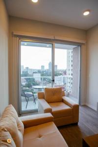 Uma área de estar em Cookandmusicapartments Forvm Molas Lopez