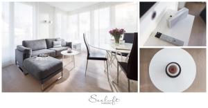 - un salon avec un canapé et une table dans l'établissement Seeloft (Nr. 04), à Norderney