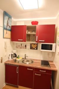 Η κουζίνα ή μικρή κουζίνα στο Ferienwohnung Koje 16