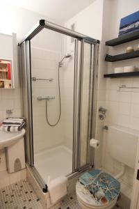 Ένα μπάνιο στο Ferienwohnung Koje 16