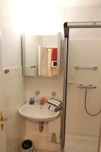 Ένα μπάνιο στο Ferienwohnung Koje 16