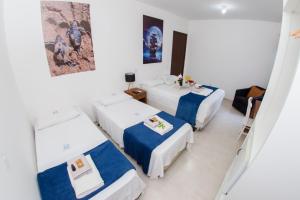 En eller flere senge i et værelse på Pousada Dom Marujo + 58 billeder