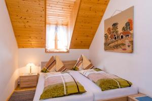 A bed or beds in a room at Almidylle Sabathy