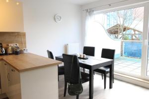 Kuchyň nebo kuchyňský kout v ubytování Kurparkcarree - Ferienwohnung Meeresbrise