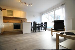 Kuchyň nebo kuchyňský kout v ubytování Kurparkcarree - Ferienwohnung Meeresbrise