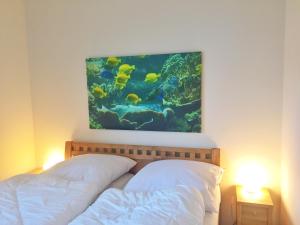 Postel nebo postele na pokoji v ubytování Kurparkcarree - Ferienwohnung "Amber"