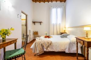 Postel nebo postele na pokoji v ubytování San Giovanni Apartment