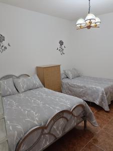 Säng eller sängar i ett rum på Casa rural Mccoy 2