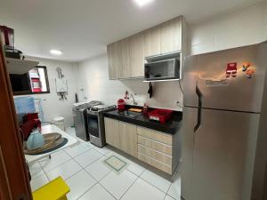 Eldhús eða eldhúskrókur á Apartamentos 250m da Orla -Edifício Nugali- Castelo B Temporada