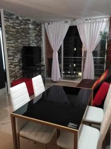 Posezení v ubytování Espectacular apartamento de 3 habitaciones con piscina y parqueadero privado Excelente Relacion Precio Calidad Puntaje
