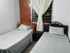 Postel nebo postele na pokoji v ubytování Espectacular apartamento de 3 habitaciones con piscina y parqueadero privado Excelente Relacion Precio Calidad Puntaje