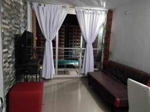 Bazén v ubytování Espectacular apartamento de 3 habitaciones con piscina y parqueadero privado Excelente Relacion Precio Calidad Puntaje nebo v jeho okolí
