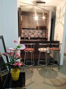 Posezení v ubytování Espectacular apartamento de 3 habitaciones con piscina y parqueadero privado Excelente Relacion Precio Calidad Puntaje