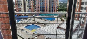 Bazén v ubytování Espectacular apartamento de 3 habitaciones con piscina y parqueadero privado Excelente Relacion Precio Calidad Puntaje nebo v jeho okolí