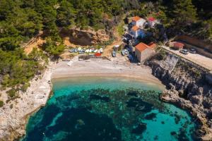 an aerial view of a beach with a resort at Apartments with a parking space Babino Polje, Mljet - 22321 in Babino Polje