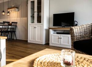 TV a/nebo společenská místnost v ubytování Imbergblick
