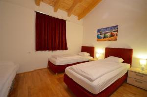 Posteľ alebo postele v izbe v ubytovaní APT Mountain View by - Alpen Apartments