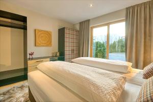 Posteľ alebo postele v izbe v ubytovaní Gletscherblick 1 - by Alpen Apartments