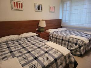 Postel nebo postele na pokoji v ubytování Casa Don Willo