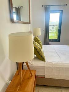 Postel nebo postele na pokoji v ubytování Canggu - Pererenan Guesthouse " aBaliHouse "