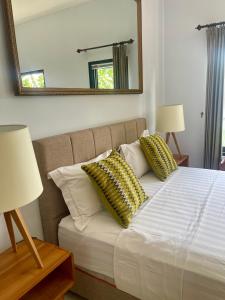 Postel nebo postele na pokoji v ubytování Canggu - Pererenan Guesthouse " aBaliHouse "