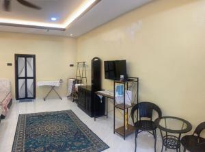 Μια τηλεόραση ή/και κέντρο ψυχαγωγίας στο Makndak Roomstay